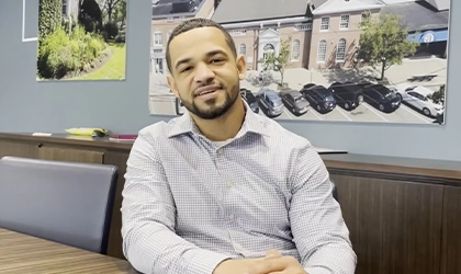 Carlos discussing what it's like to be part of The Village Bank.